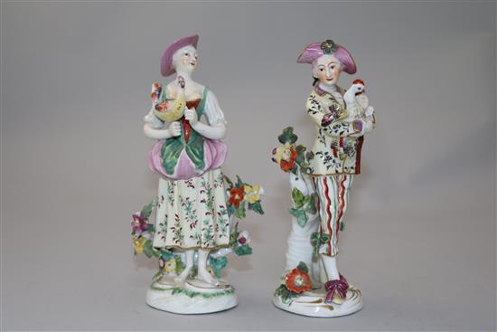 A pair of Derby figures of the Italian Farmers and a pair of Derby candlestick figures, 20.5cm, losses (4)